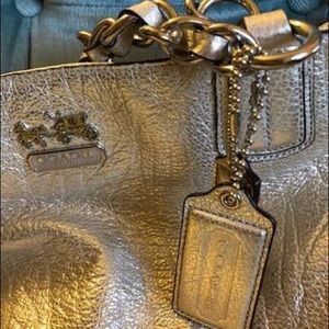 Pewter-gold Coach purse. Fully lined. Excellent detail/condition. Matching bag.